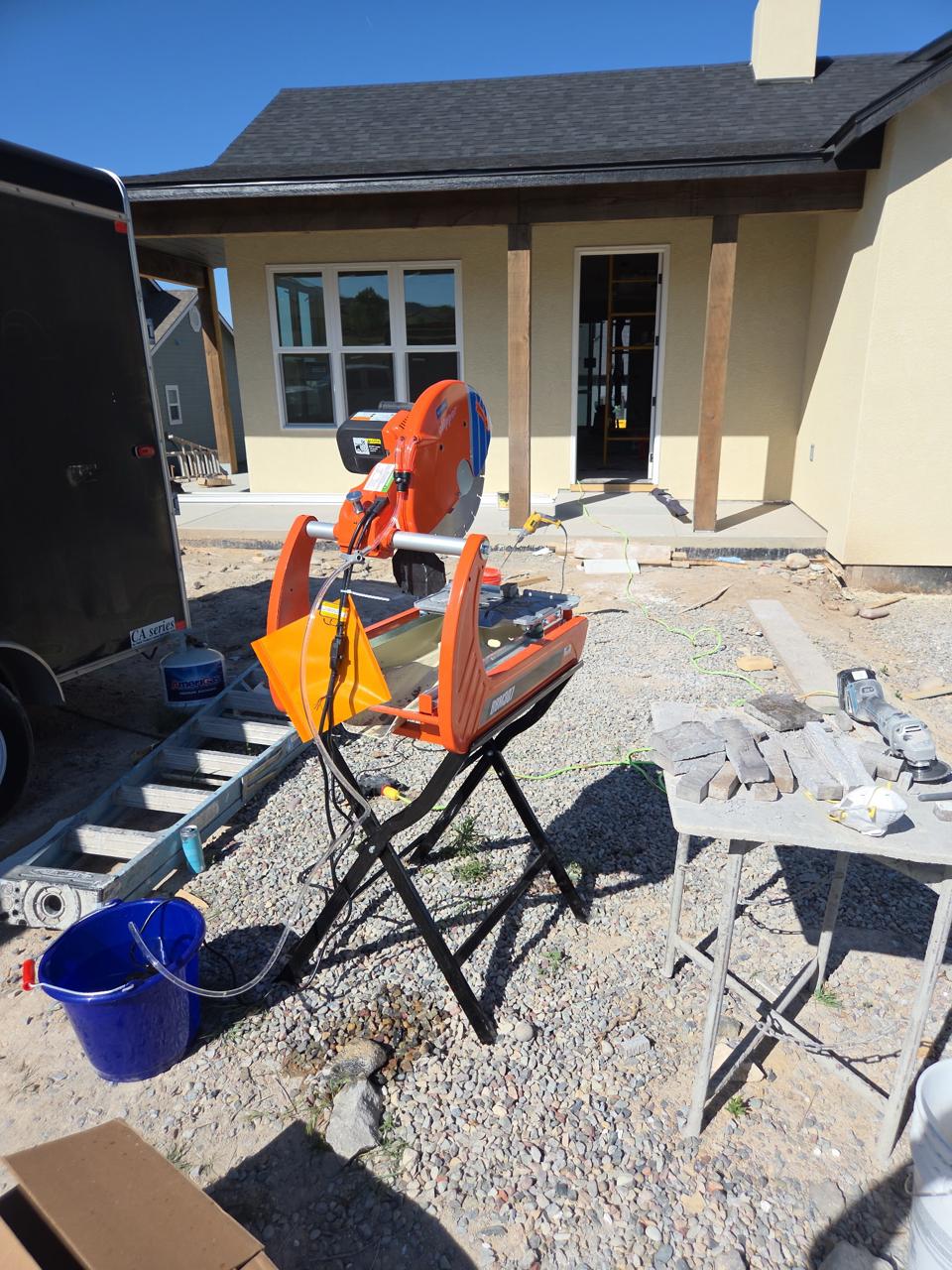 Masonry work site and stone cutting setup